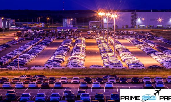 Volkswagen, Russia, Kaluga - AUGUST 26, 2020: New cars parked at distribution center of automobile factory at night with lights. Parking on the open air.