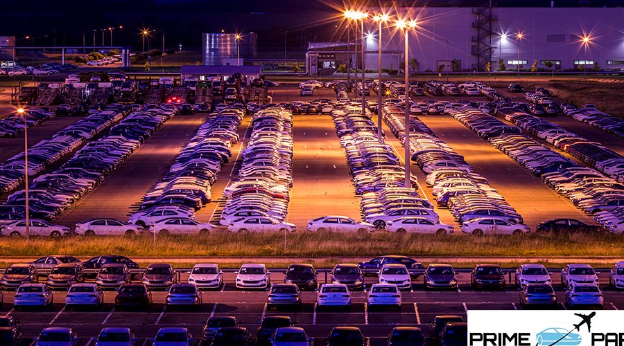 Volkswagen, Russia, Kaluga - AUGUST 26, 2020: New cars parked at distribution center of automobile factory at night with lights. Parking on the open air.