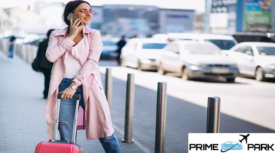 Woman with phone at airport